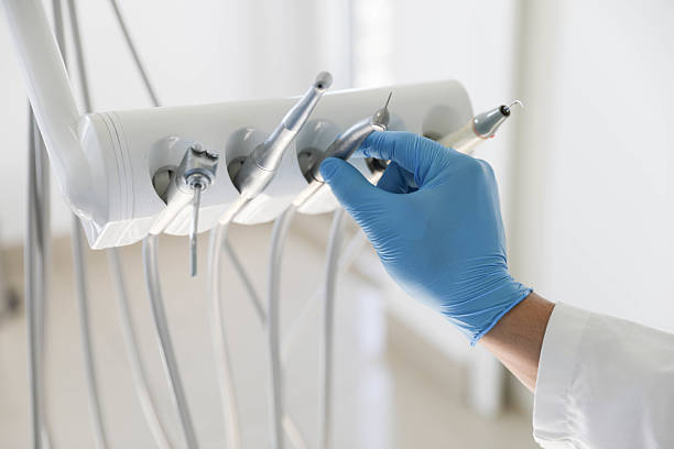 Professional Tooth Extraction technician working in Somerset, TX